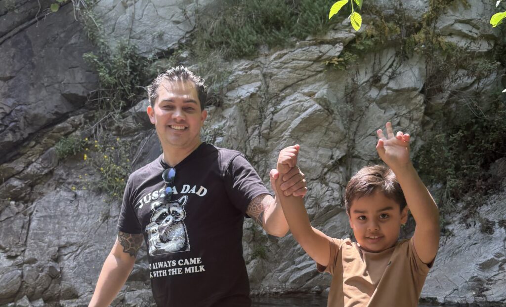 Alain Harada spends time with his son hiking.